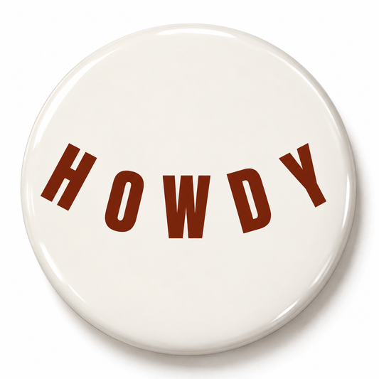 Howdy cream pin-back button with bold maroon lettering